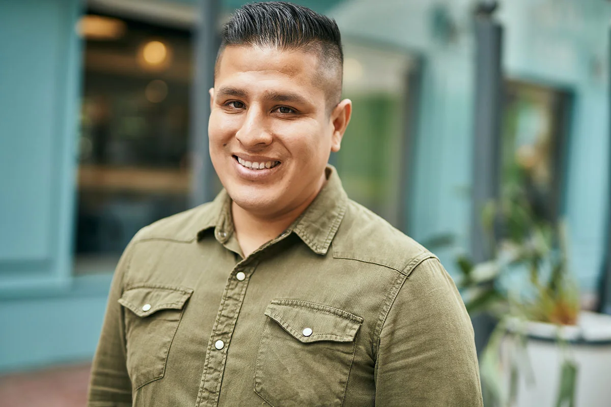 smiling man experiencing the benefits of his medication-assisted treatment for addiction
