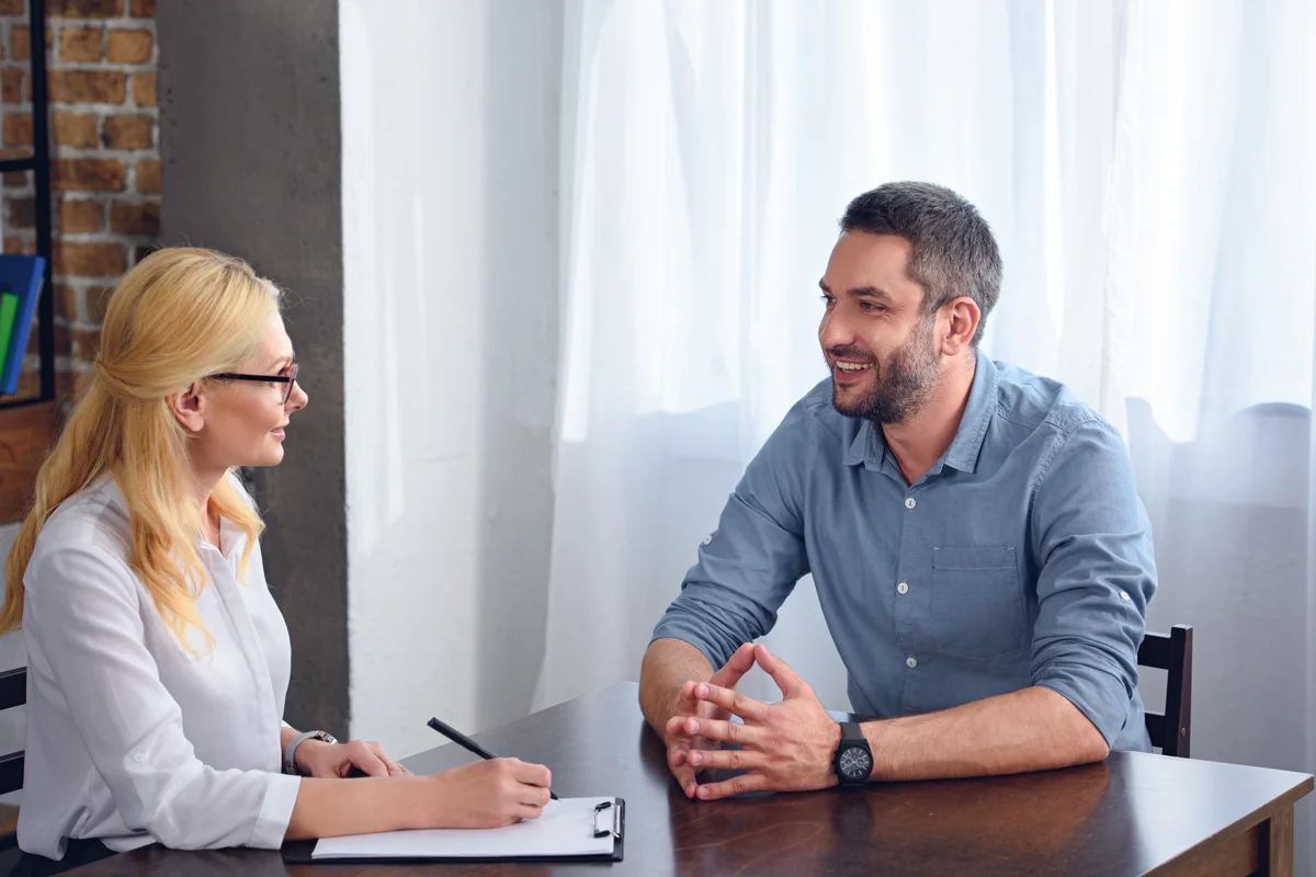 Man speaking to psychiatrist